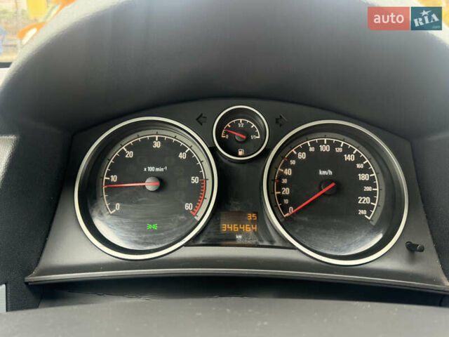 Красный Опель Астра, объемом двигателя 1.9 л и пробегом 348 тыс. км за 4000 $, фото 21 на Automoto.ua