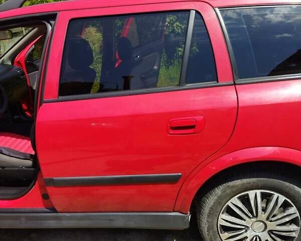 Красный Опель Астра, объемом двигателя 1.6 л и пробегом 398 тыс. км за 3500 $, фото 37 на Automoto.ua