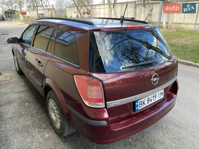 Червоний Опель Астра, об'ємом двигуна 1.4 л та пробігом 210 тис. км за 4200 $, фото 1 на Automoto.ua
