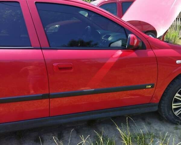 Красный Опель Астра, объемом двигателя 1.6 л и пробегом 398 тыс. км за 3500 $, фото 24 на Automoto.ua