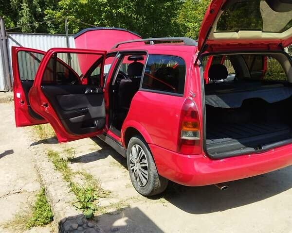 Красный Опель Астра, объемом двигателя 1.6 л и пробегом 398 тыс. км за 3500 $, фото 38 на Automoto.ua