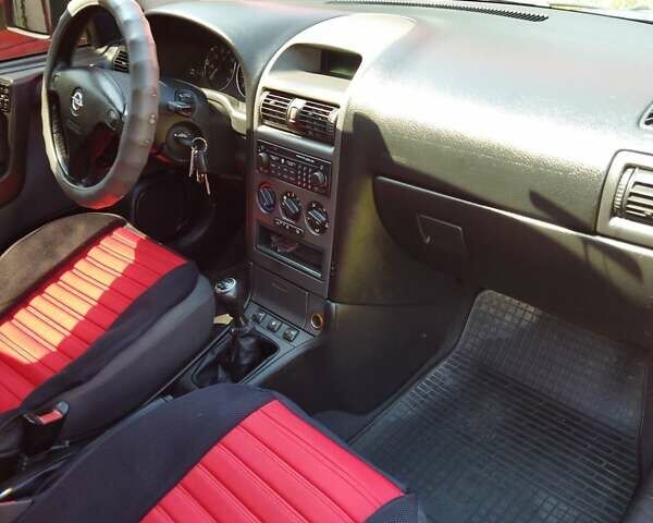 Красный Опель Астра, объемом двигателя 1.6 л и пробегом 398 тыс. км за 3500 $, фото 25 на Automoto.ua