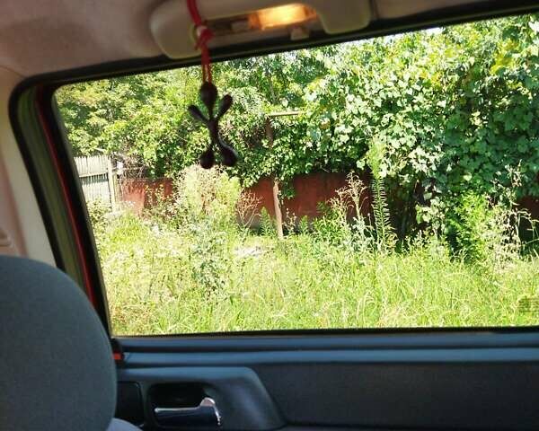 Красный Опель Астра, объемом двигателя 1.6 л и пробегом 398 тыс. км за 3500 $, фото 1 на Automoto.ua