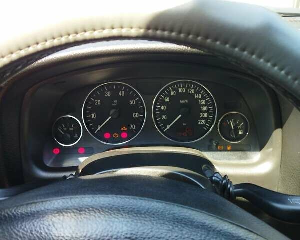 Красный Опель Астра, объемом двигателя 1.6 л и пробегом 398 тыс. км за 3500 $, фото 14 на Automoto.ua