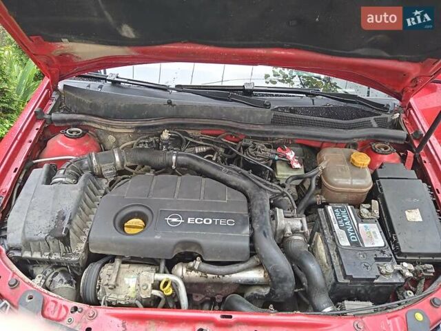 Красный Опель Астра, объемом двигателя 1.69 л и пробегом 314 тыс. км за 4000 $, фото 4 на Automoto.ua