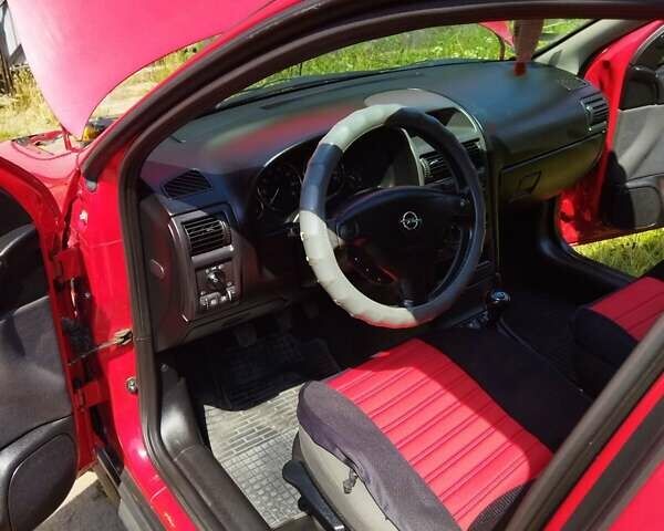 Красный Опель Астра, объемом двигателя 1.6 л и пробегом 398 тыс. км за 3500 $, фото 32 на Automoto.ua