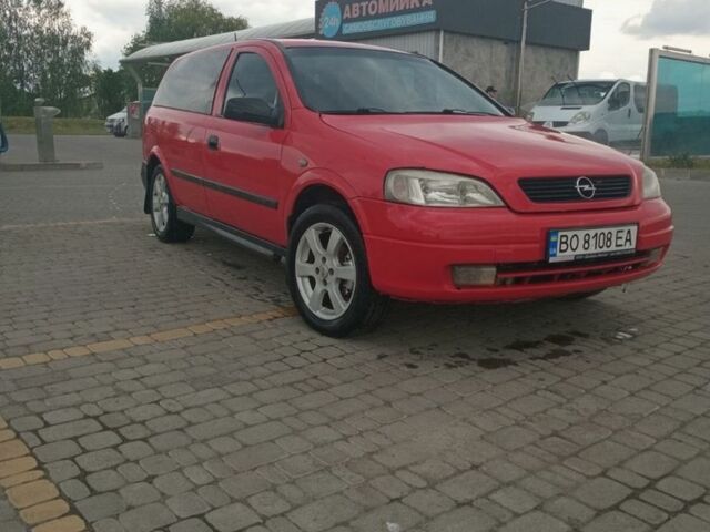 Красный Опель Астра, объемом двигателя 1.7 л и пробегом 300 тыс. км за 2350 $, фото 1 на Automoto.ua