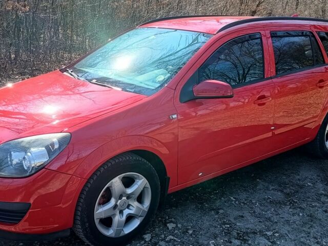 Червоний Опель Астра, об'ємом двигуна 1 л та пробігом 330 тис. км за 5500 $, фото 3 на Automoto.ua