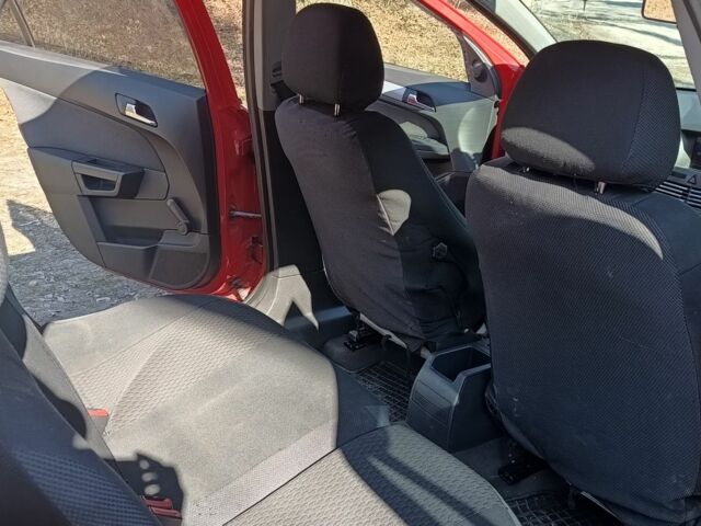 Червоний Опель Астра, об'ємом двигуна 1 л та пробігом 330 тис. км за 5500 $, фото 13 на Automoto.ua