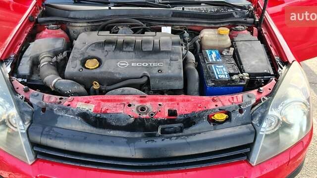 Красный Опель Астра, объемом двигателя 1.9 л и пробегом 332 тыс. км за 5500 $, фото 15 на Automoto.ua