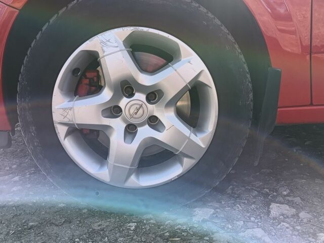 Червоний Опель Астра, об'ємом двигуна 1 л та пробігом 330 тис. км за 5500 $, фото 4 на Automoto.ua