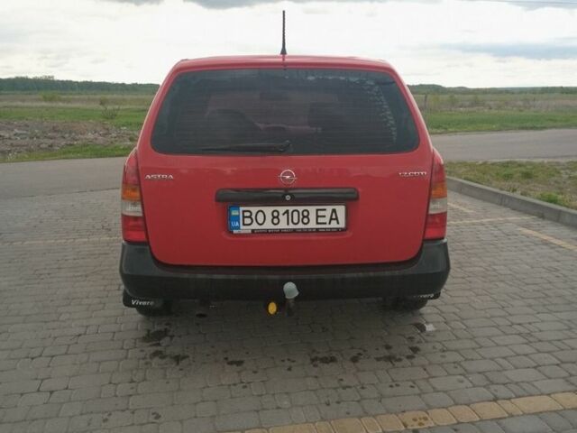 Красный Опель Астра, объемом двигателя 1.7 л и пробегом 300 тыс. км за 2350 $, фото 4 на Automoto.ua