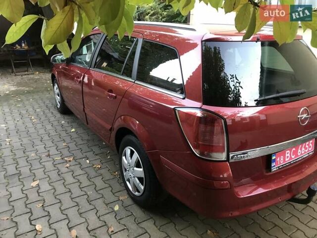 Красный Опель Астра, объемом двигателя 1.8 л и пробегом 244 тыс. км за 5300 $, фото 6 на Automoto.ua