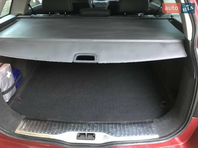 Красный Опель Астра, объемом двигателя 1.8 л и пробегом 244 тыс. км за 5300 $, фото 4 на Automoto.ua