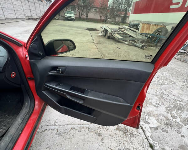 Красный Опель Астра, объемом двигателя 1.3 л и пробегом 539 тыс. км за 4000 $, фото 6 на Automoto.ua