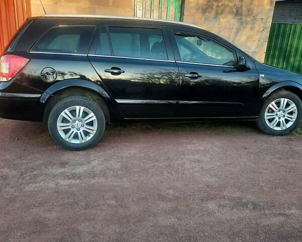 Красный Опель Астра, объемом двигателя 1.6 л и пробегом 240 тыс. км за 5200 $, фото 8 на Automoto.ua