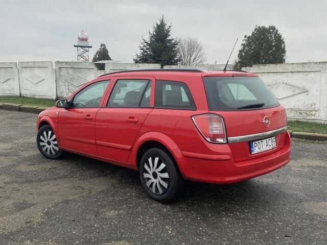 Красный Опель Астра, объемом двигателя 1.7 л и пробегом 300 тыс. км за 2750 $, фото 1 на Automoto.ua