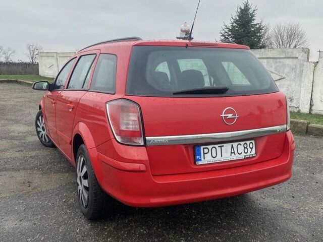 Красный Опель Астра, объемом двигателя 1.7 л и пробегом 300 тыс. км за 2750 $, фото 4 на Automoto.ua