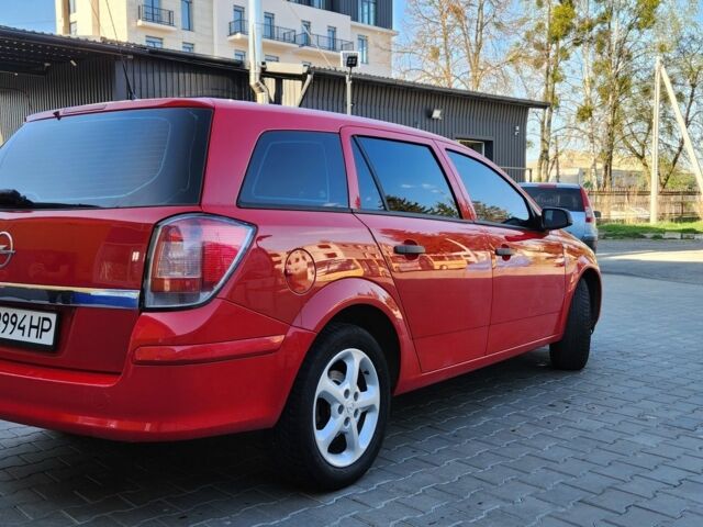 Красный Опель Астра, объемом двигателя 1.4 л и пробегом 217 тыс. км за 4950 $, фото 1 на Automoto.ua