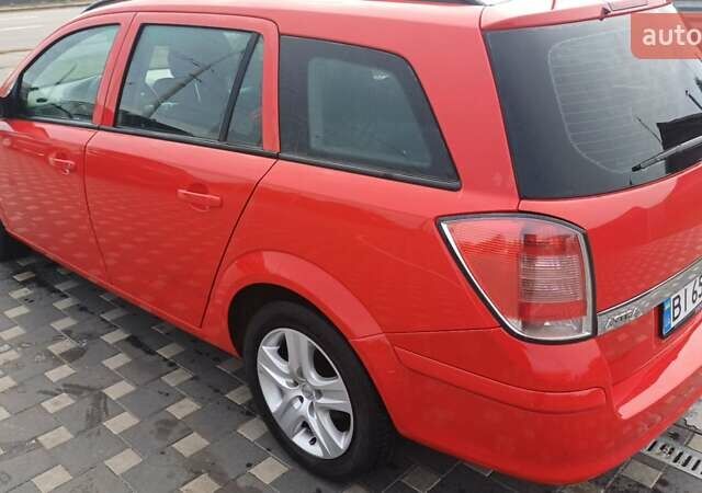 Красный Опель Астра, объемом двигателя 1.6 л и пробегом 187 тыс. км за 5900 $, фото 3 на Automoto.ua