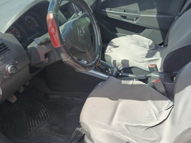 Красный Опель Астра, объемом двигателя 1.4 л и пробегом 217 тыс. км за 4950 $, фото 6 на Automoto.ua