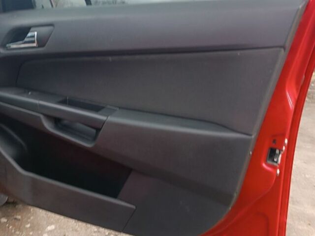 Красный Опель Астра, объемом двигателя 1.4 л и пробегом 256 тыс. км за 3700 $, фото 6 на Automoto.ua