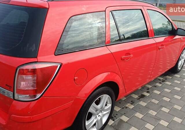 Красный Опель Астра, объемом двигателя 1.6 л и пробегом 187 тыс. км за 5900 $, фото 2 на Automoto.ua