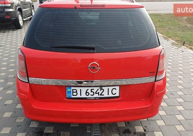 Красный Опель Астра, объемом двигателя 1.6 л и пробегом 187 тыс. км за 5900 $, фото 1 на Automoto.ua