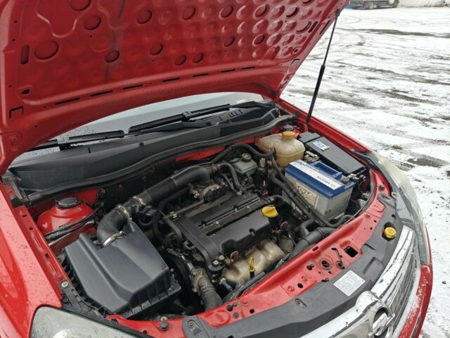 Красный Опель Астра, объемом двигателя 1.4 л и пробегом 217 тыс. км за 4950 $, фото 7 на Automoto.ua