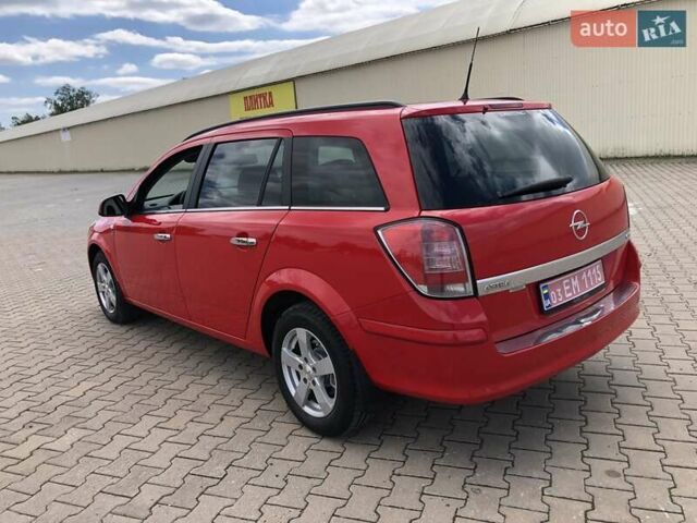 Красный Опель Астра, объемом двигателя 1.3 л и пробегом 229 тыс. км за 5990 $, фото 7 на Automoto.ua
