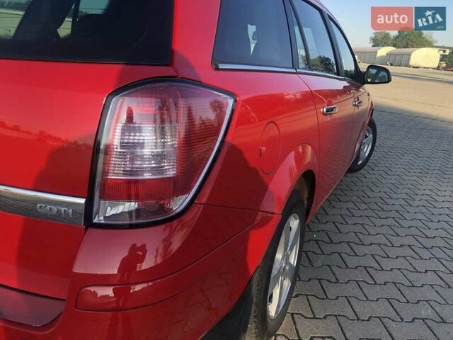 Красный Опель Астра, объемом двигателя 1.3 л и пробегом 229 тыс. км за 5990 $, фото 19 на Automoto.ua