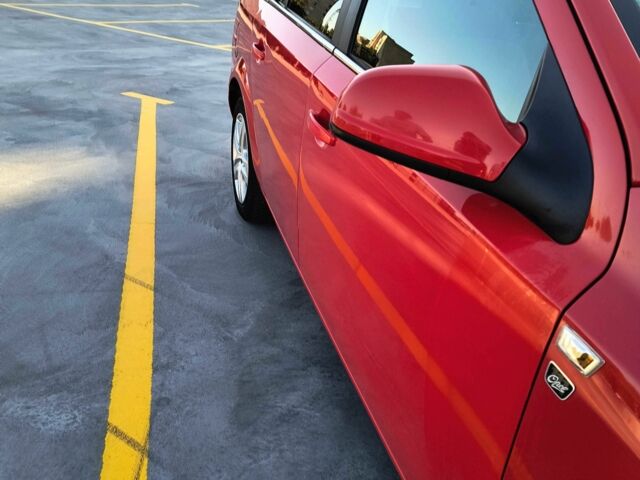 Красный Опель Астра, объемом двигателя 1.7 л и пробегом 241 тыс. км за 4900 $, фото 3 на Automoto.ua