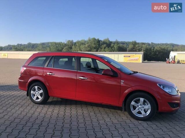 Красный Опель Астра, объемом двигателя 1.3 л и пробегом 229 тыс. км за 5990 $, фото 6 на Automoto.ua