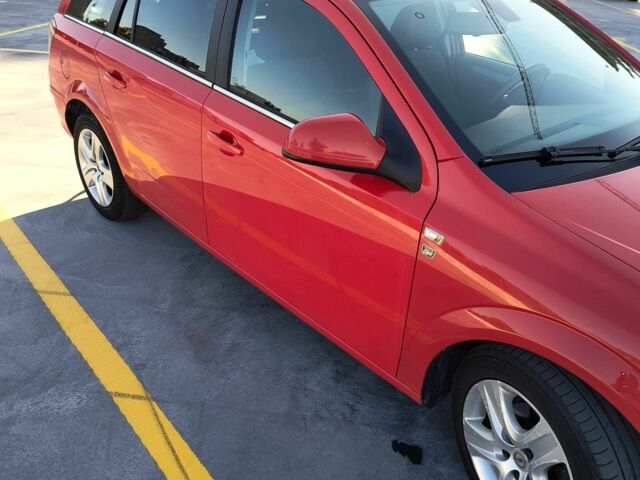 Красный Опель Астра, объемом двигателя 1.7 л и пробегом 241 тыс. км за 4900 $, фото 23 на Automoto.ua