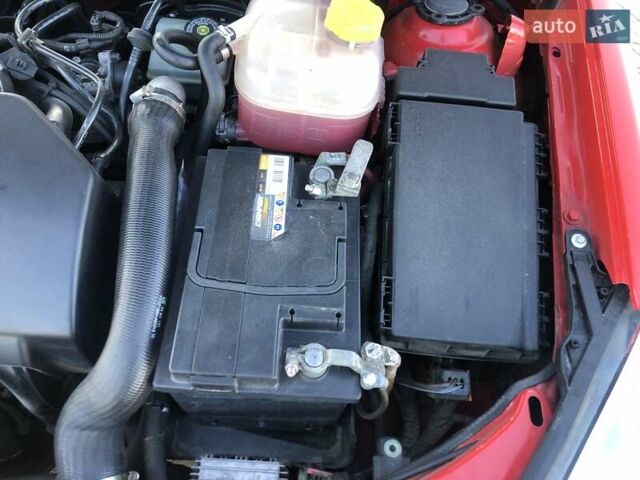 Красный Опель Астра, объемом двигателя 1.3 л и пробегом 229 тыс. км за 5990 $, фото 11 на Automoto.ua