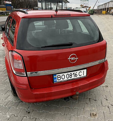 Красный Опель Астра, объемом двигателя 1.7 л и пробегом 246 тыс. км за 5200 $, фото 2 на Automoto.ua