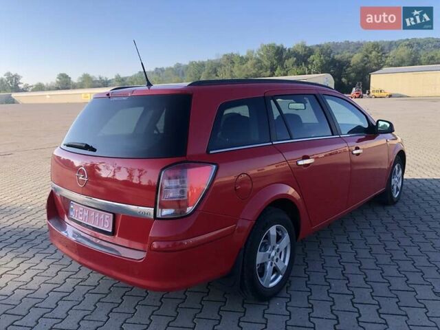 Красный Опель Астра, объемом двигателя 1.3 л и пробегом 229 тыс. км за 5990 $, фото 8 на Automoto.ua