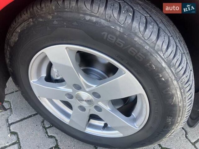 Красный Опель Астра, объемом двигателя 1.3 л и пробегом 229 тыс. км за 5990 $, фото 16 на Automoto.ua