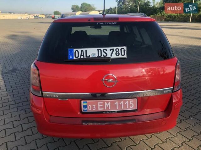Красный Опель Астра, объемом двигателя 1.3 л и пробегом 229 тыс. км за 5990 $, фото 17 на Automoto.ua
