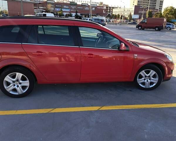 Красный Опель Астра, объемом двигателя 1.7 л и пробегом 241 тыс. км за 4900 $, фото 5 на Automoto.ua