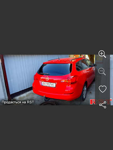 Красный Опель Астра, объемом двигателя 1.25 л и пробегом 240 тыс. км за 6300 $, фото 1 на Automoto.ua