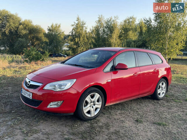 Красный Опель Астра, объемом двигателя 1.69 л и пробегом 270 тыс. км за 6600 $, фото 2 на Automoto.ua