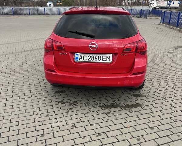 Красный Опель Астра, объемом двигателя 1.69 л и пробегом 220 тыс. км за 6600 $, фото 4 на Automoto.ua