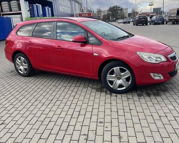 Красный Опель Астра, объемом двигателя 1.69 л и пробегом 220 тыс. км за 6600 $, фото 1 на Automoto.ua