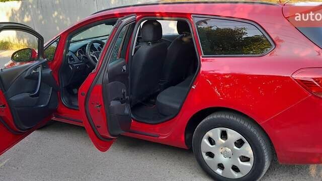 Красный Опель Астра, объемом двигателя 1.25 л и пробегом 240 тыс. км за 6300 $, фото 4 на Automoto.ua