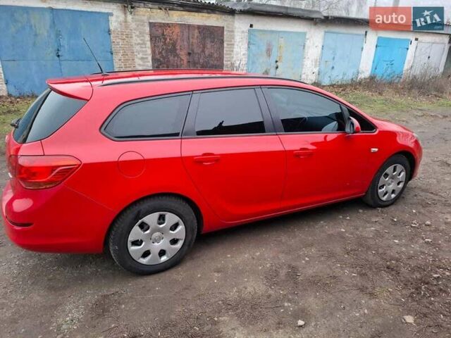 Червоний Опель Астра, об'ємом двигуна 1.4 л та пробігом 230 тис. км за 6500 $, фото 14 на Automoto.ua