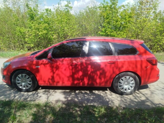 Красный Опель Астра, объемом двигателя 1.2 л и пробегом 265 тыс. км за 5500 $, фото 4 на Automoto.ua