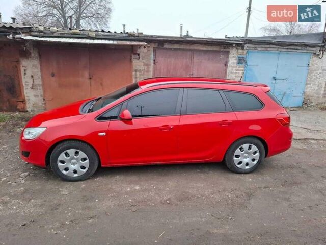 Червоний Опель Астра, об'ємом двигуна 1.4 л та пробігом 230 тис. км за 6500 $, фото 2 на Automoto.ua