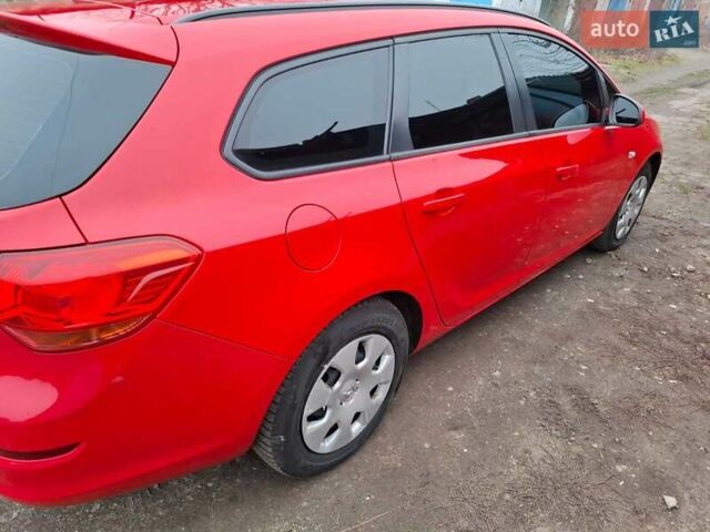 Червоний Опель Астра, об'ємом двигуна 1.4 л та пробігом 230 тис. км за 6500 $, фото 11 на Automoto.ua
