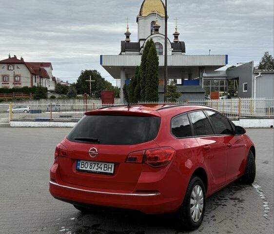 Красный Опель Астра, объемом двигателя 1.7 л и пробегом 185 тыс. км за 7000 $, фото 2 на Automoto.ua